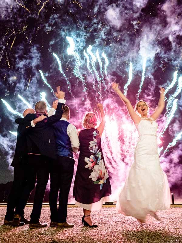 Bride dancing for joy in front of our Whisper style display