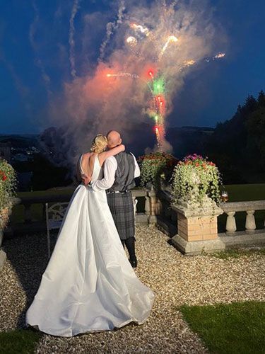 Wedding Couple watching Fireworks at Tawstock Court