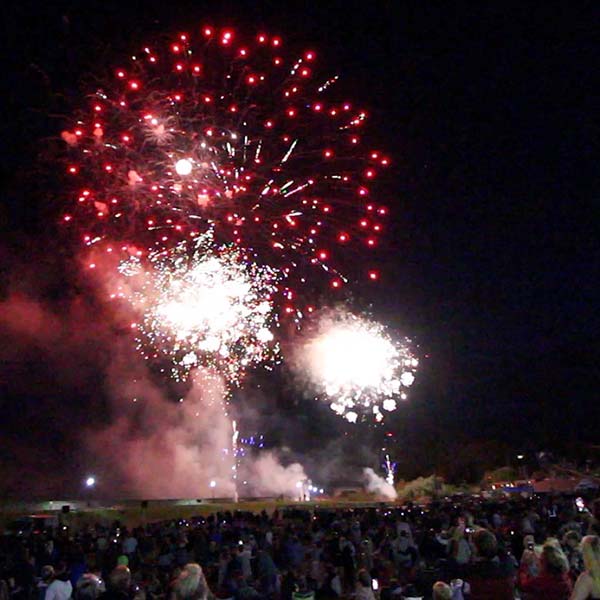 Festival crowd watching fireworks
