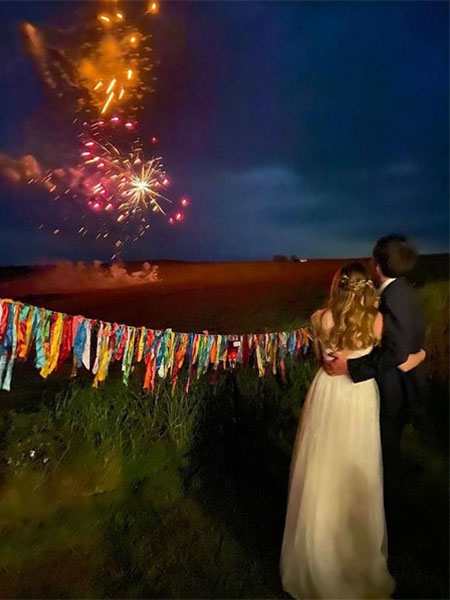 Couple watch Fireworks at Beacon Crag