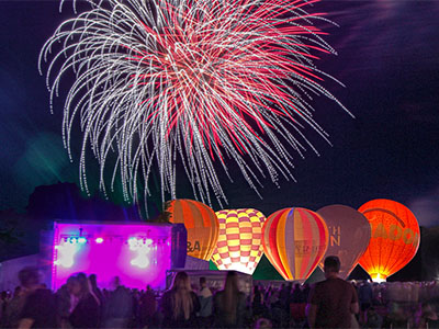 Crowd watching fireworks at a festival